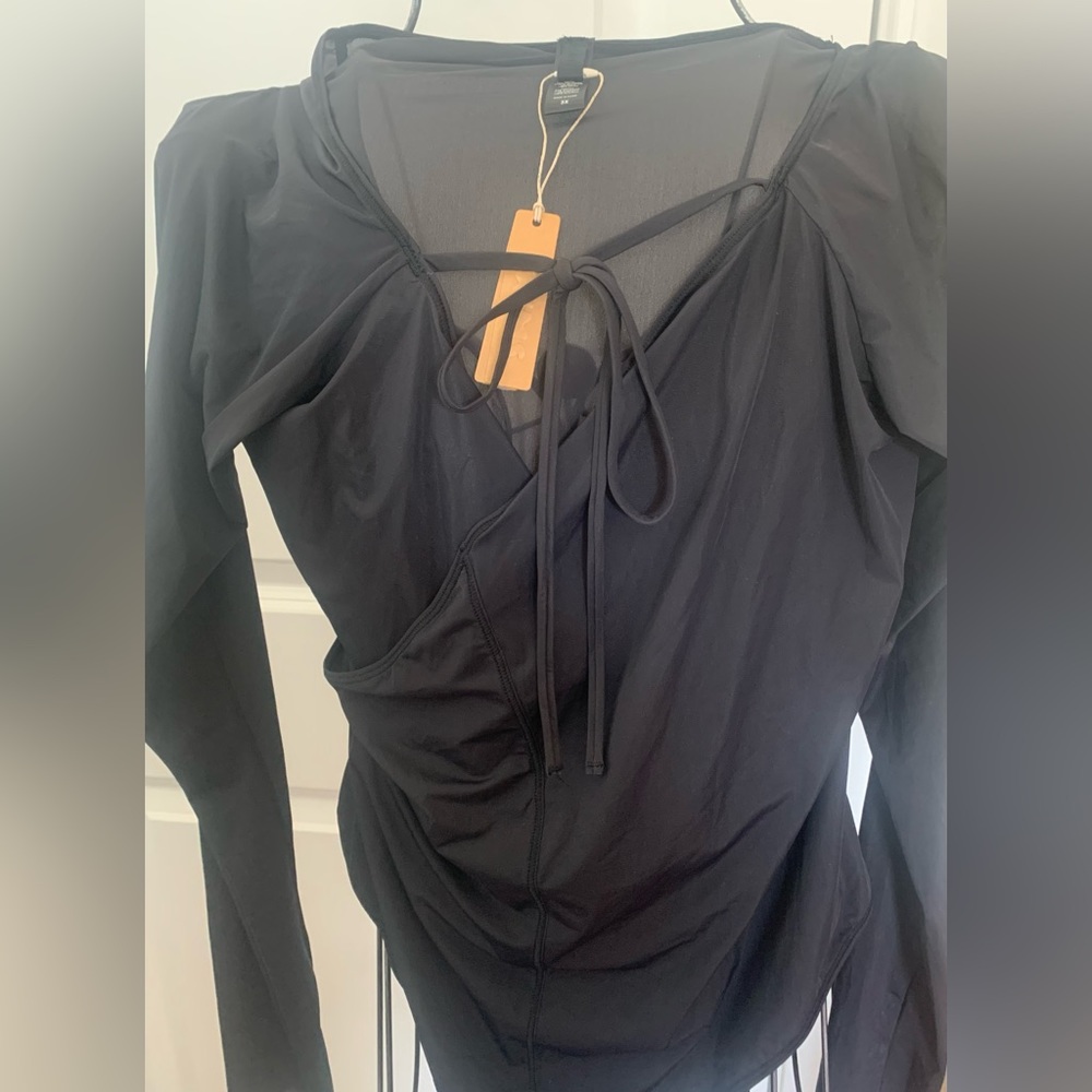 Skims long sleeve thong bodysuit/swimsuit